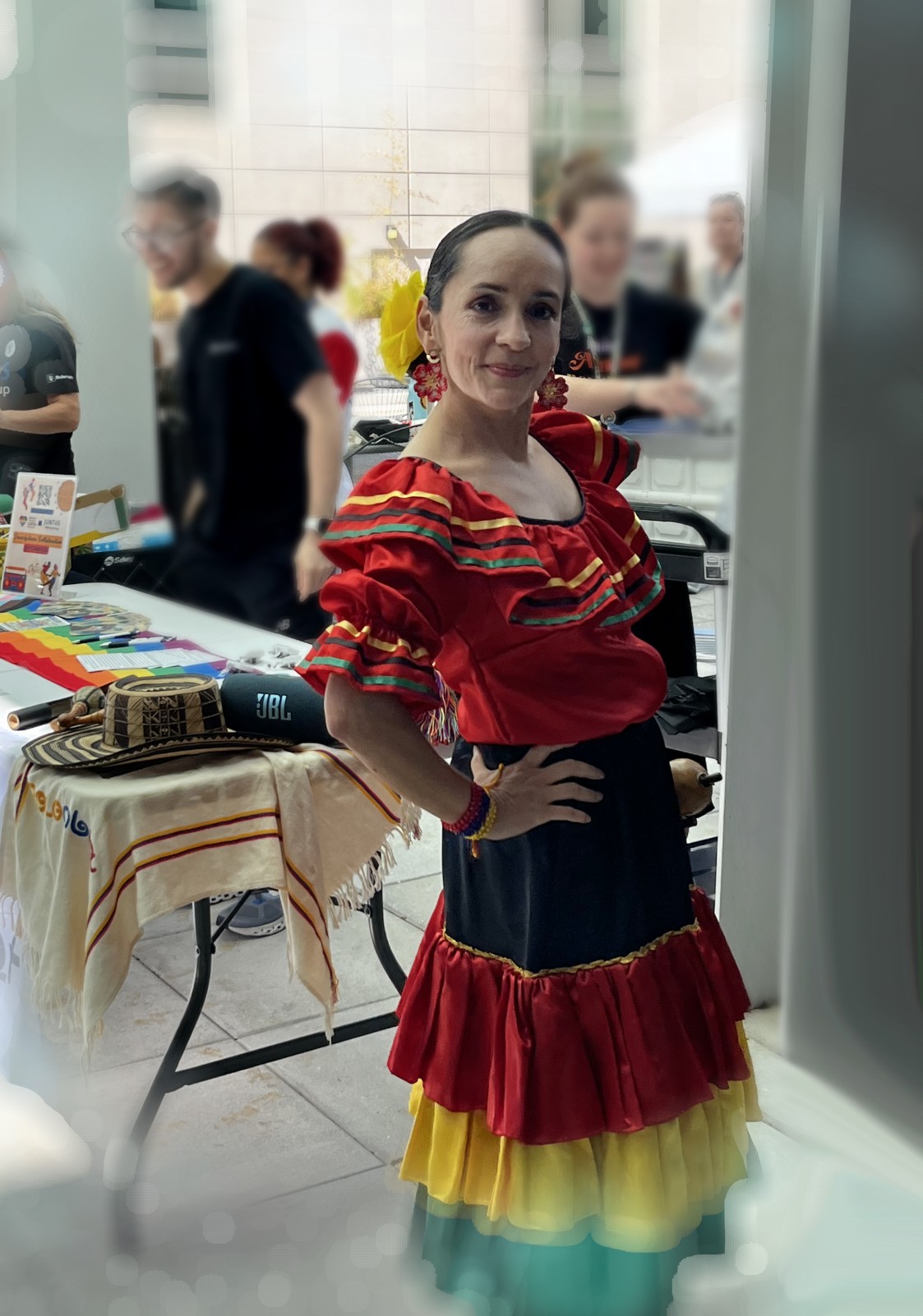 Angela in traditional Colombian dress at a community celebration